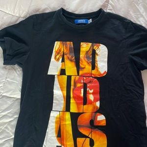 Adidas men’s black T-shirt, with a model wearing boxing gloves depicted on shirt